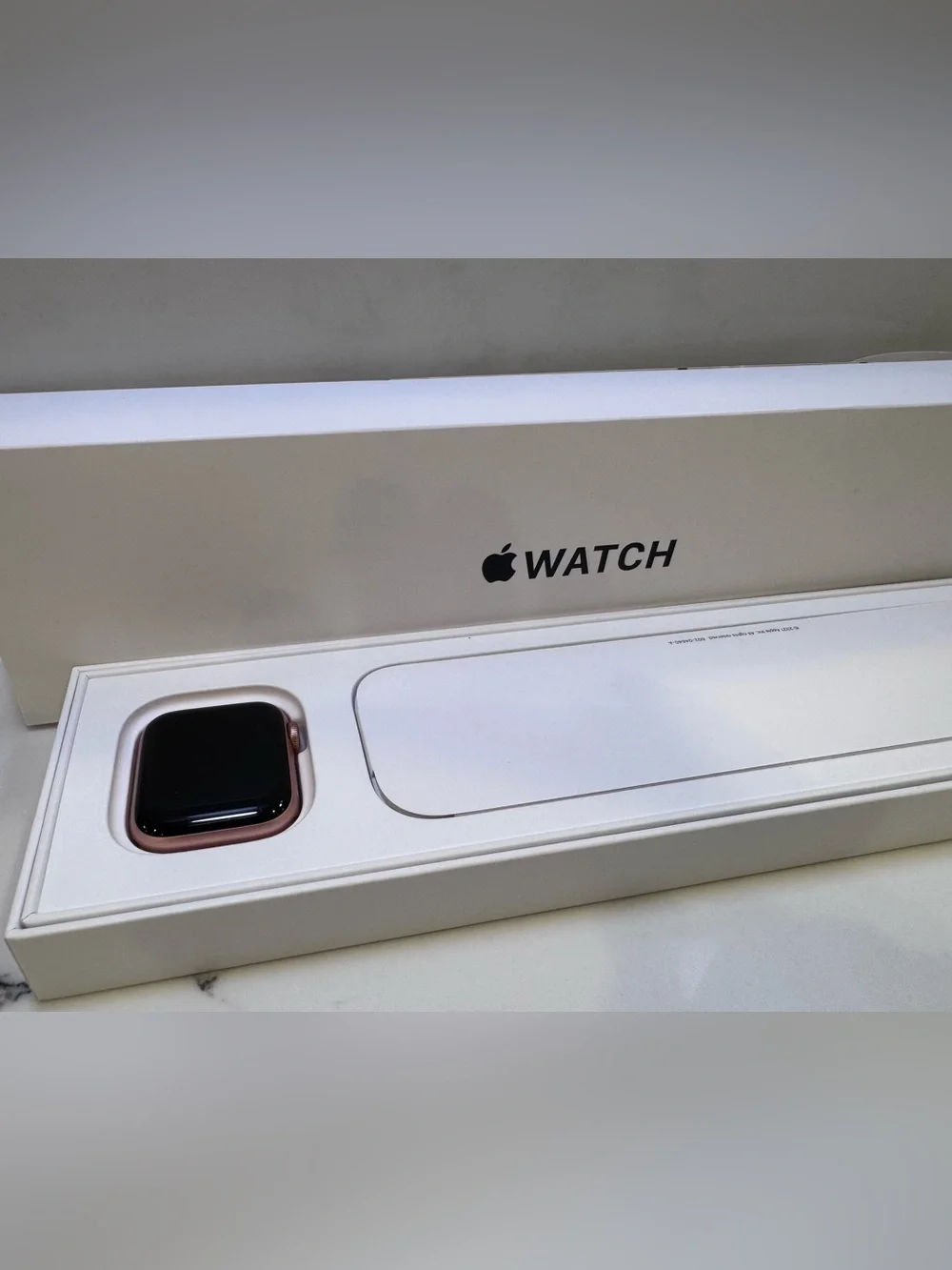 Apple Watch with White Sport Band and Rose Gold Crown